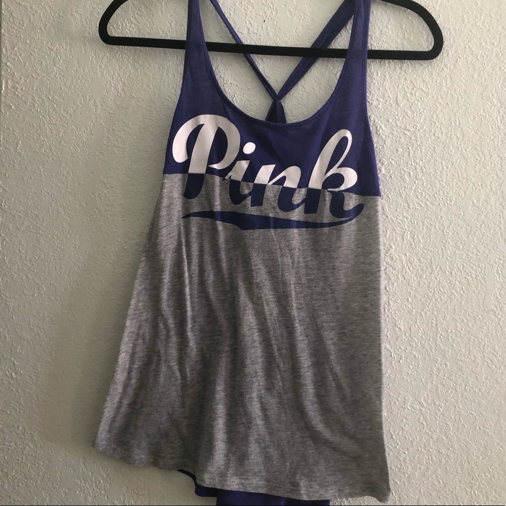 Pink size medium tank top colors blue,gray, white says pink tied back